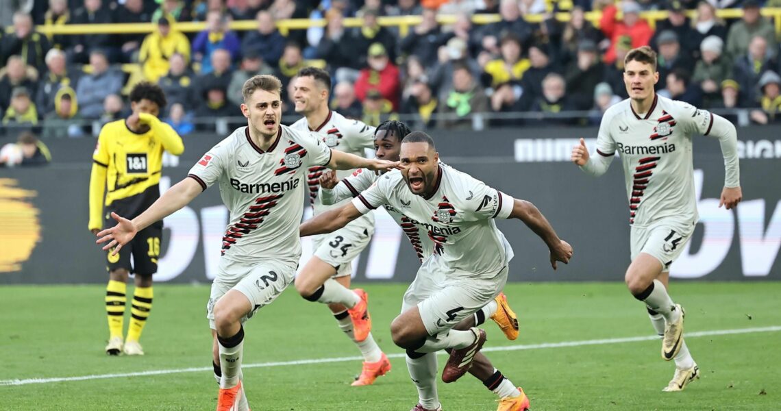 Stanisic grabs 97th-minute equaliser as Leverkusen deny Dortmund to extend unbeaten run