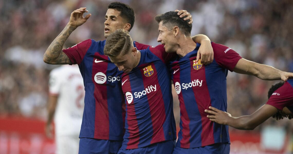 Barcelona end season with narrow win over Sevilla as Xavi signs off
