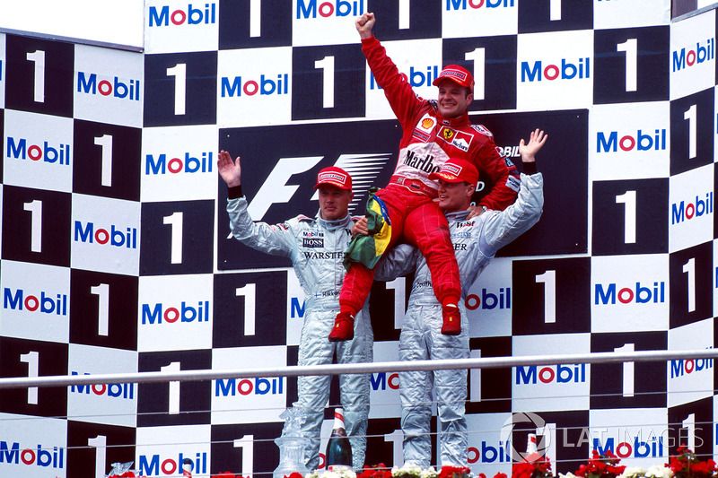 Podium: Race winner Rubens Barrichello, Ferrari F1 2000, second place Mika Hakkinen, Mclaren  MP4-15, third place David Coulthard, Mclaren MP4-15