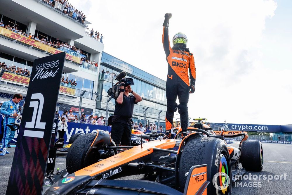 Norris celebrates on top of his upgraded MCL38