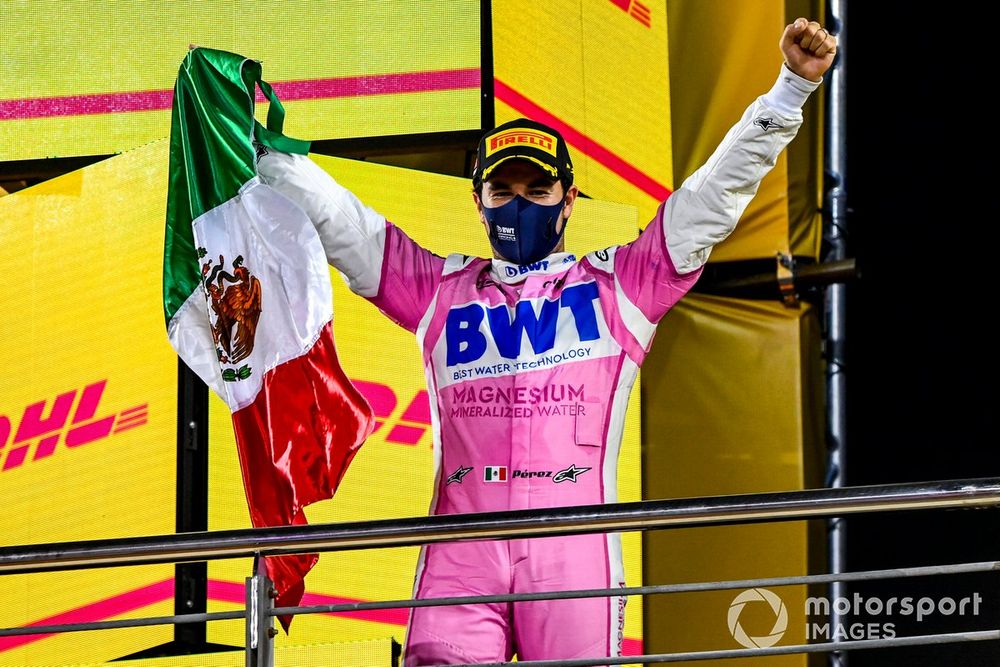 Sergio Perez, Racing Point, 1st position, on the podium with a Mexican flag