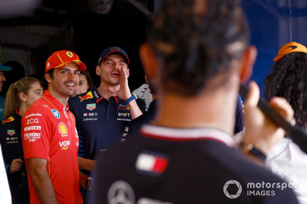 Max Verstappen, Red Bull Racing, and Carlos Sainz, Scuderia Ferrari, before the drivers parade