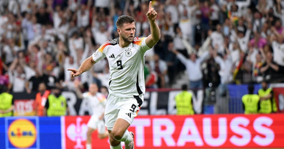 Germany grab stoppage-time equaliser to deny Switzerland and top group