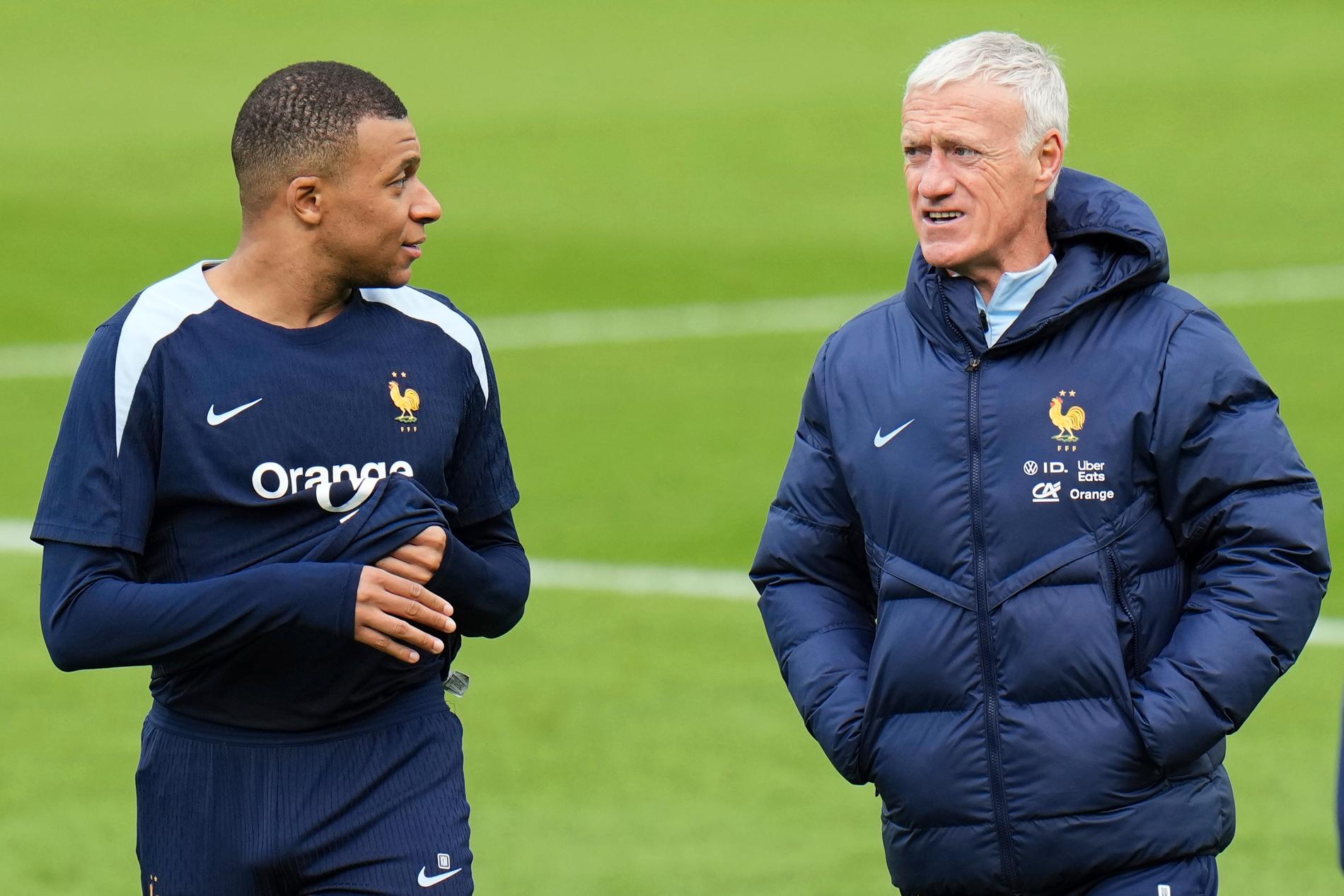 Kylian Mbappé och Didier Deschamps.
